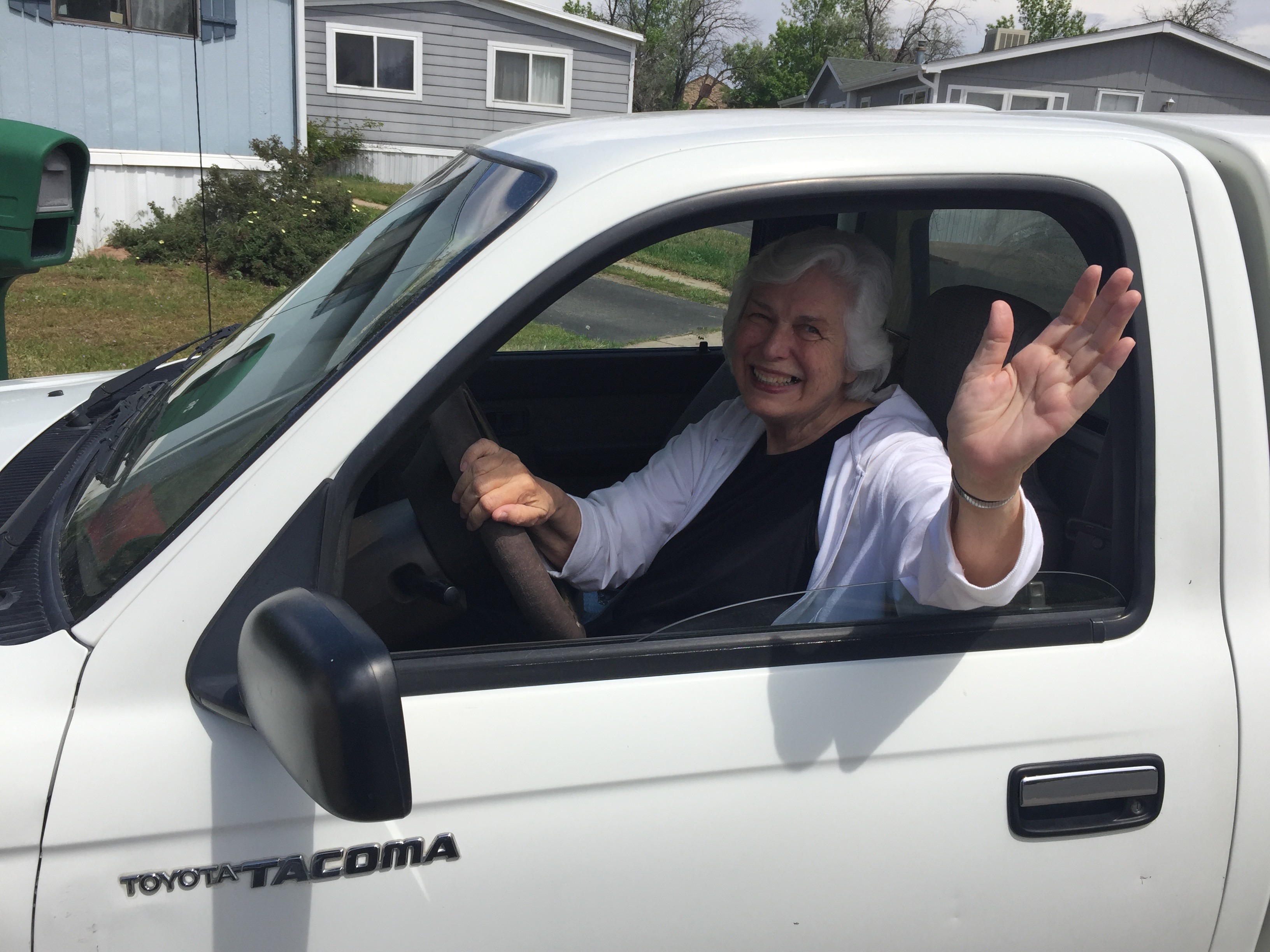 Ellen in her 'Tiny, white Van', 2019